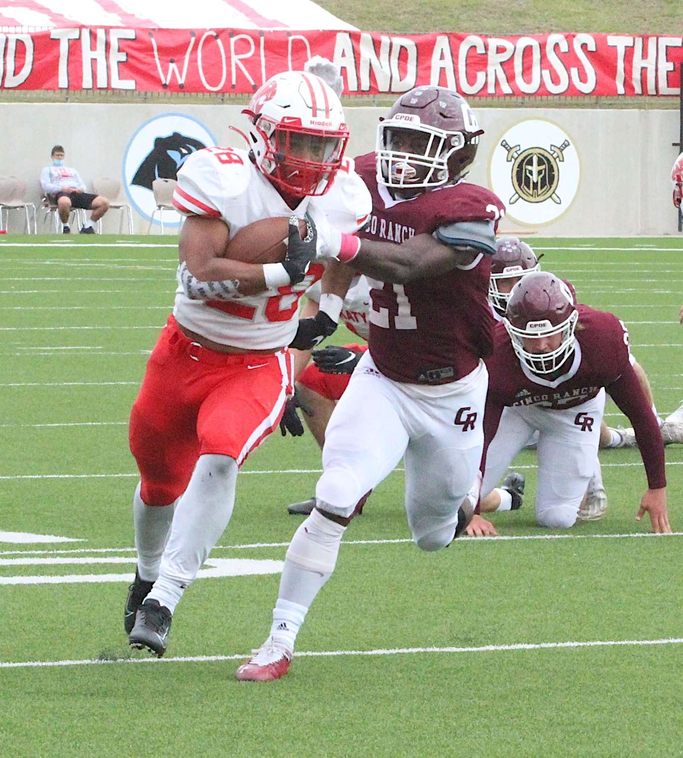 Katy High senior running back Jalen Davis breaks away from the defense during a game against Cinco Ranch on Oct. 24 at Legacy Stadium